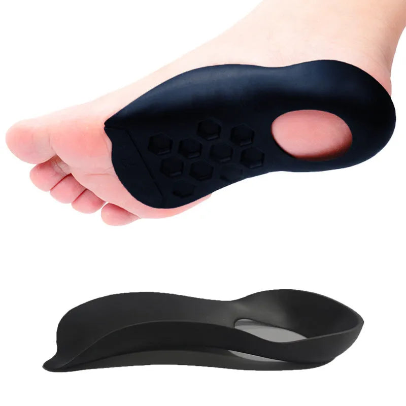 White arch support insole for varus foot correction on a grey background.