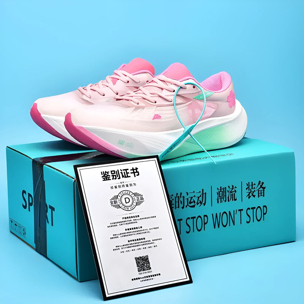 Low-top racing sneaker in glacier colour with carbon plate sole, PU mesh upper, and lace-up closure.
