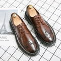 Men's black and brown business brogue shoes with round toe design and artificial leather construction