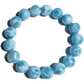 Blue handmade Bodhi bracelet with natural crystal, sea-pattern stone, and pearl in Maillard style.