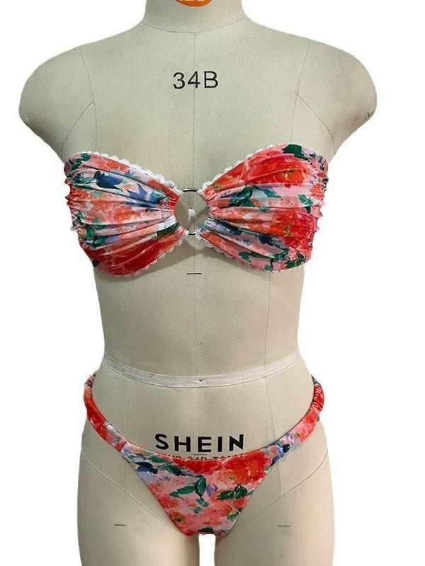 Blue floral print bikini set with lace trim on a sleeveless tube top and matching briefs.