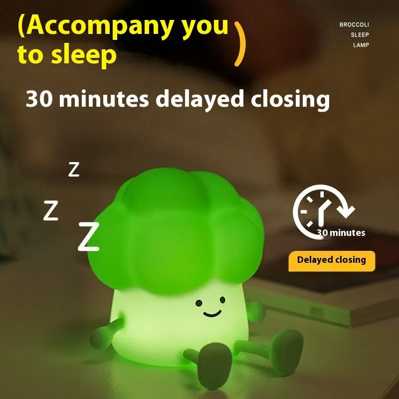 Cartoon eggplant small night lamp with soft yellow light beside broccoli design night light