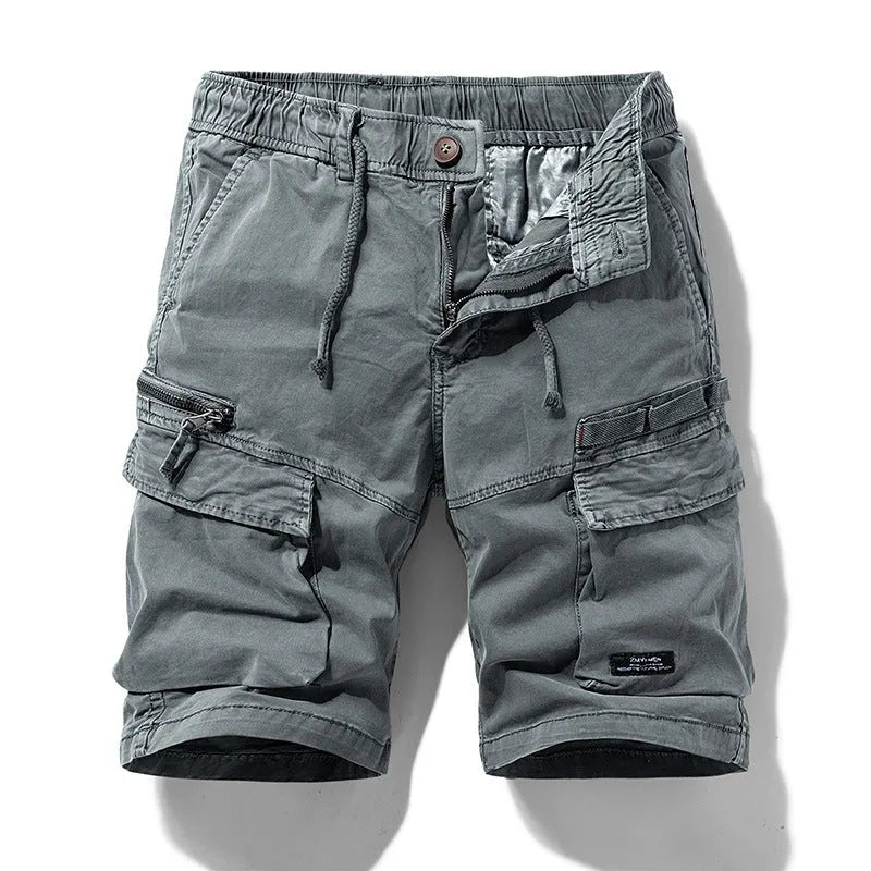 Men's army green cotton shorts with zipper and multiple pockets, shown in a Korean style fit.