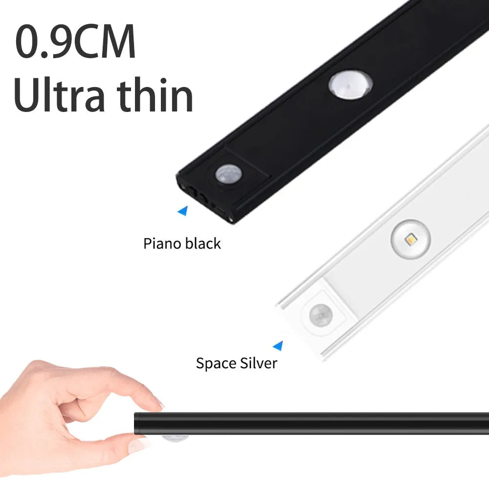 Silver ultra-thin USB rechargeable LED light strip with motion sensor for cabinet mounting.