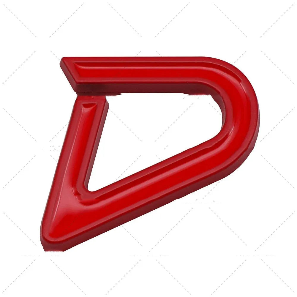 Red and silver metal SD design car sticker on a vehicle bumper.