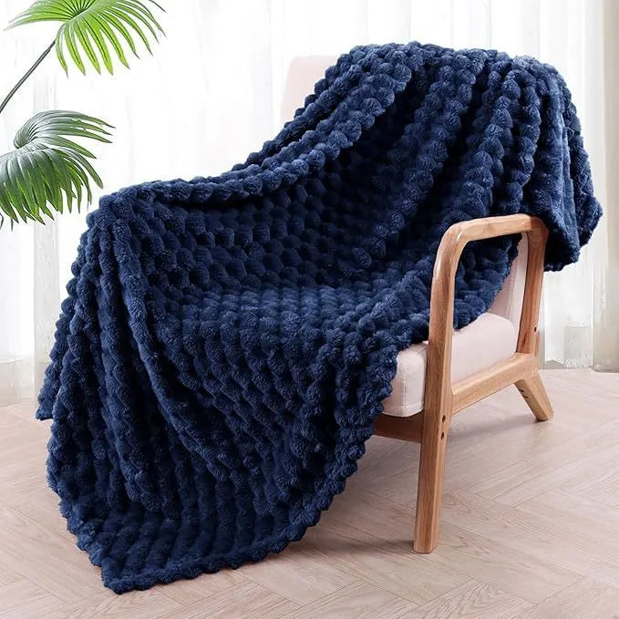 Children's soft plaid polyester blanket shown in camel colour, suitable for nap time.
