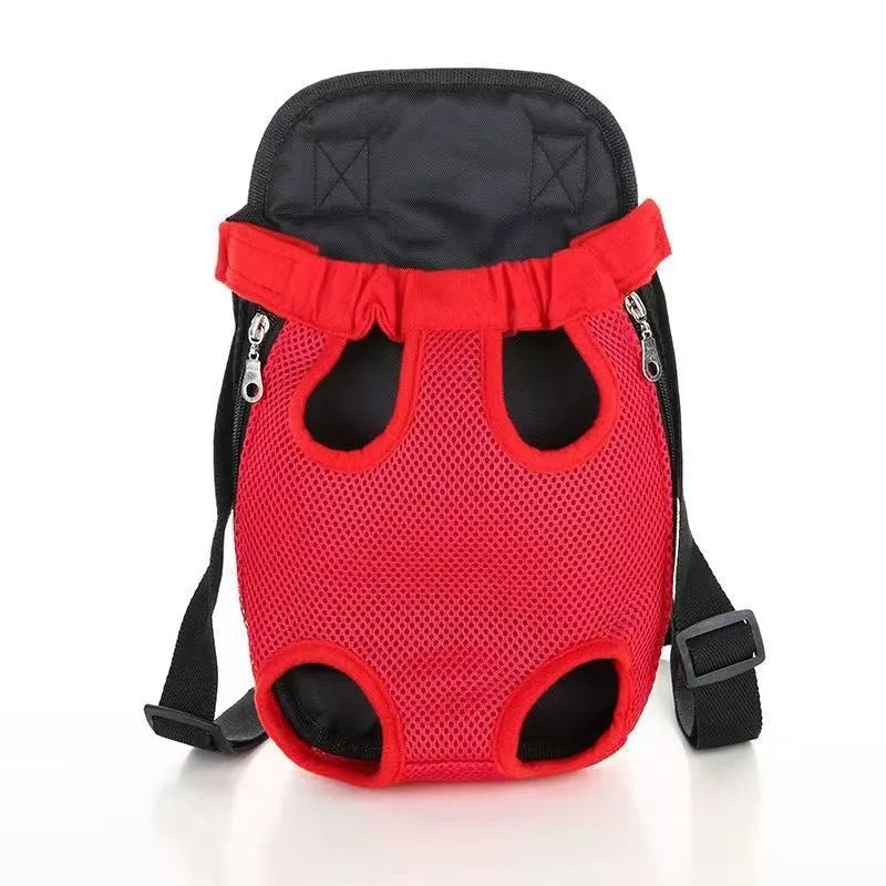 A person wearing a black dog carrier backpack containing a small dog, showing the mesh panels and adjustable straps.