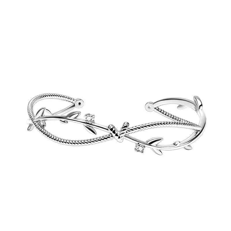 Copper tree branch sprout bracelet with cross twisted design in white gold electroplated finish