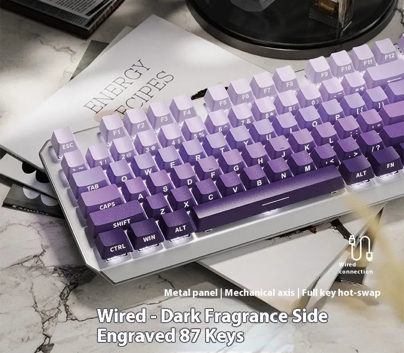 87-key wired mechanical keyboard with side-engraved keycaps, silver white finish, compact layout