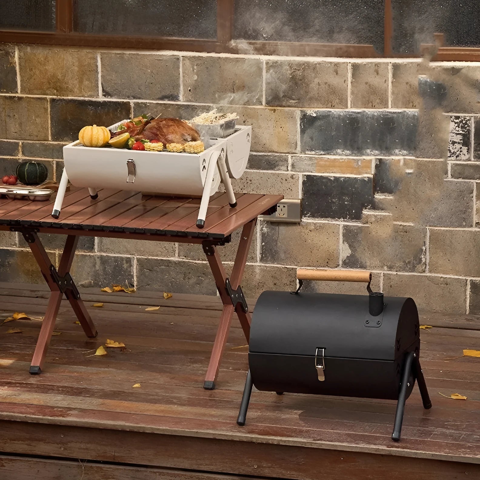 White round chimney oven style portable folding grill with carbon tanks for outdoor frying and baking.