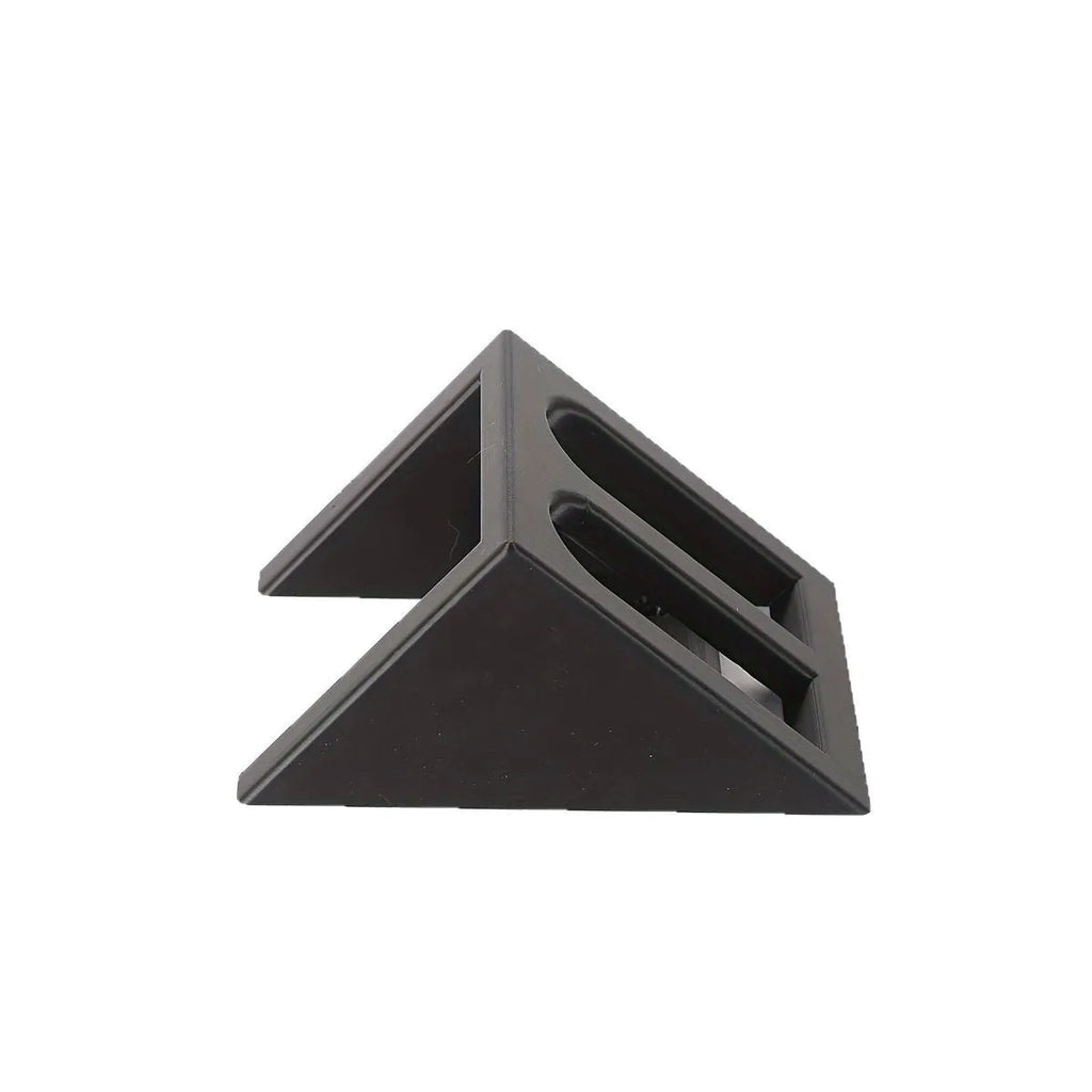Black punk-style plastic pistol stand for displaying an airsoft gun.