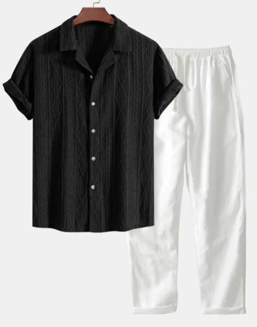 Lightweight linen-feel casual suit set with camouflage print trousers and a short-sleeved lapel shirt.