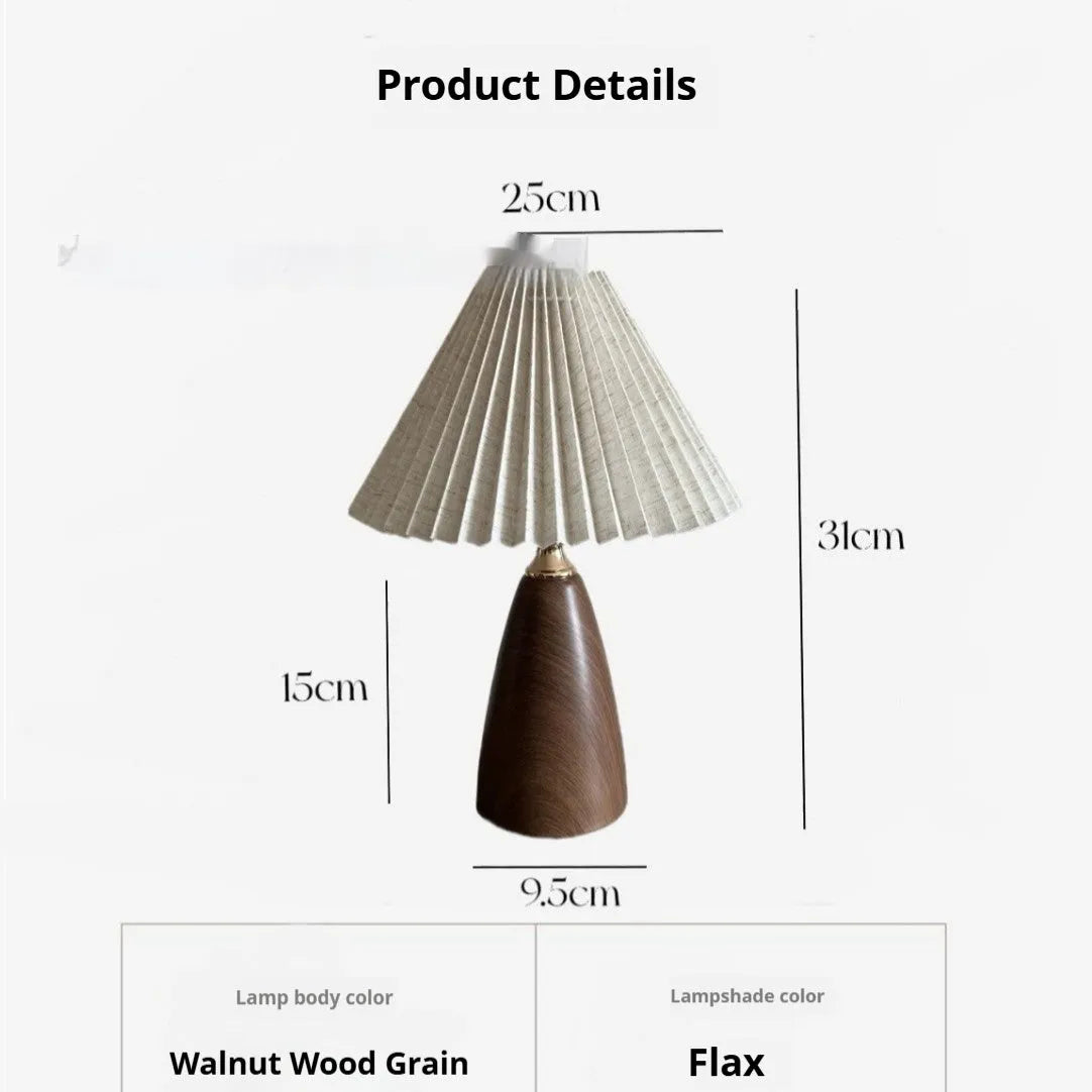 Nordic retro style ceramic table lamp with a tapered floral pleated shade and remote control on a wooden surface.