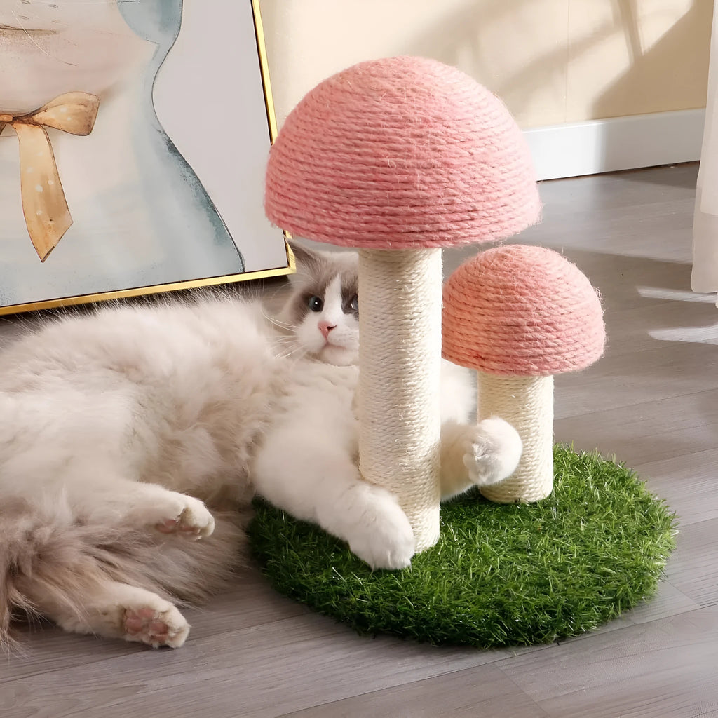 Pink mushroom-shaped cat scratching post with natural sisal caps and pole for kittens and small cats