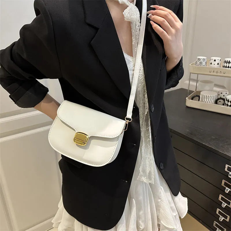 Simple PU leather women's handbag in khaki with internal zipper pocket and phone compartment.