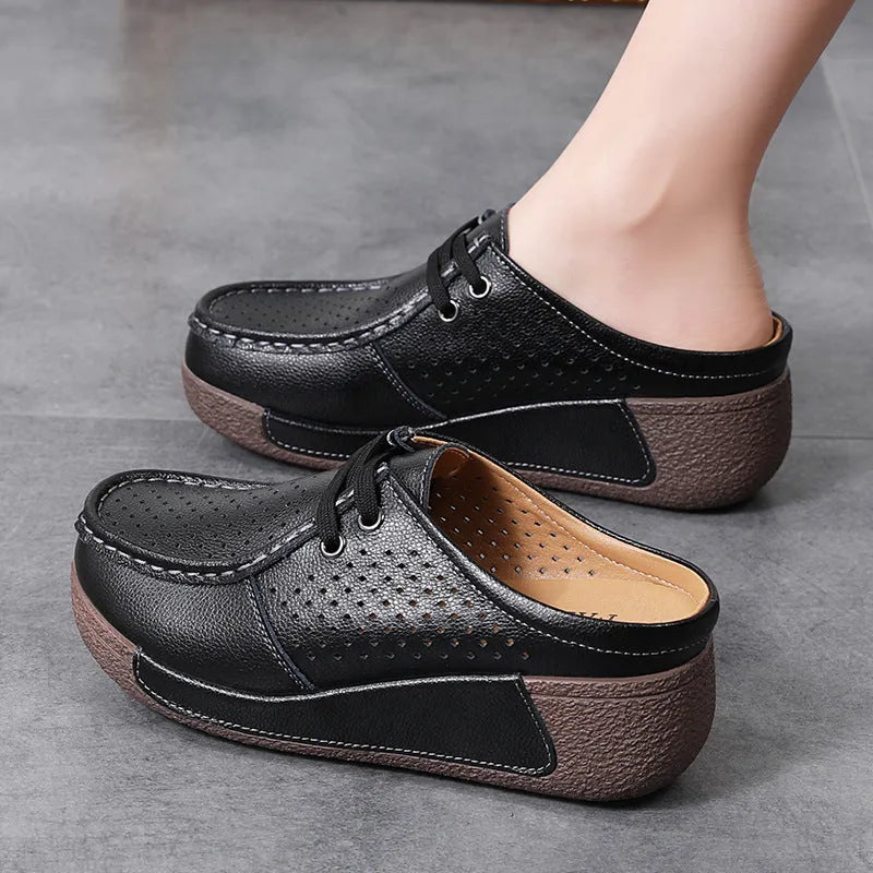 Plus size women's genuine leather platform slippers in black with round toe and hollow-out wedge sole