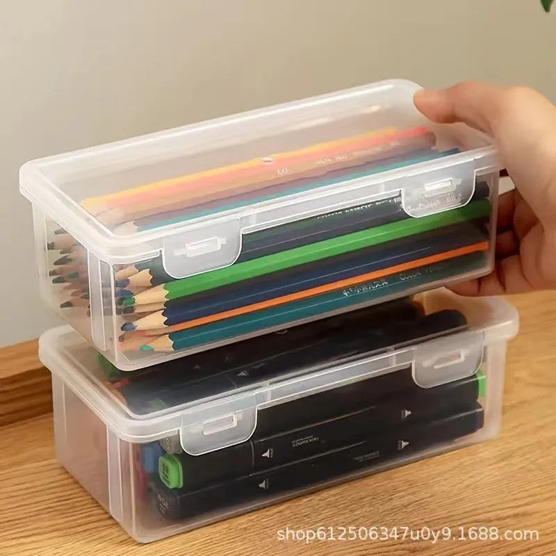 Large transparent plastic storage box full of coloured pencils and crayons