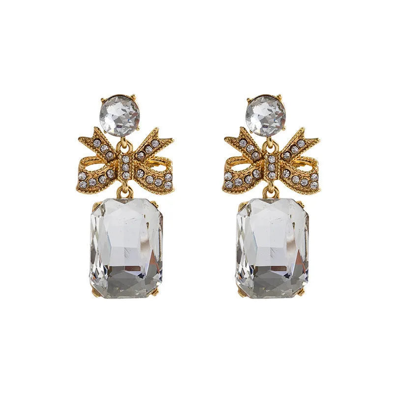 Crystal bow heart earrings for women in zinc alloy, retro style, shown in red, blue, white, and pink