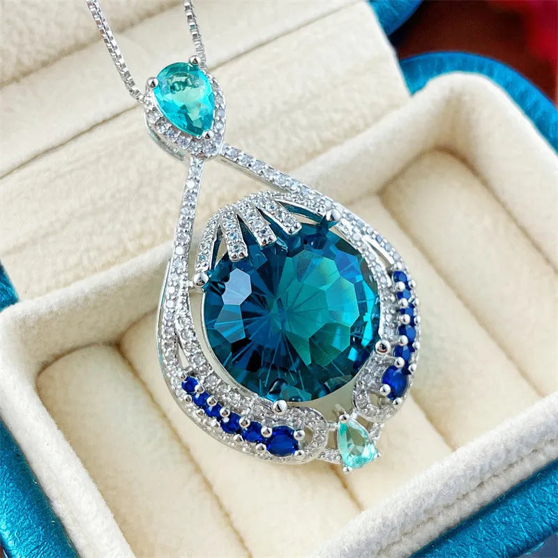 Geometric pendant necklace with blue crystal and water wave chain for women