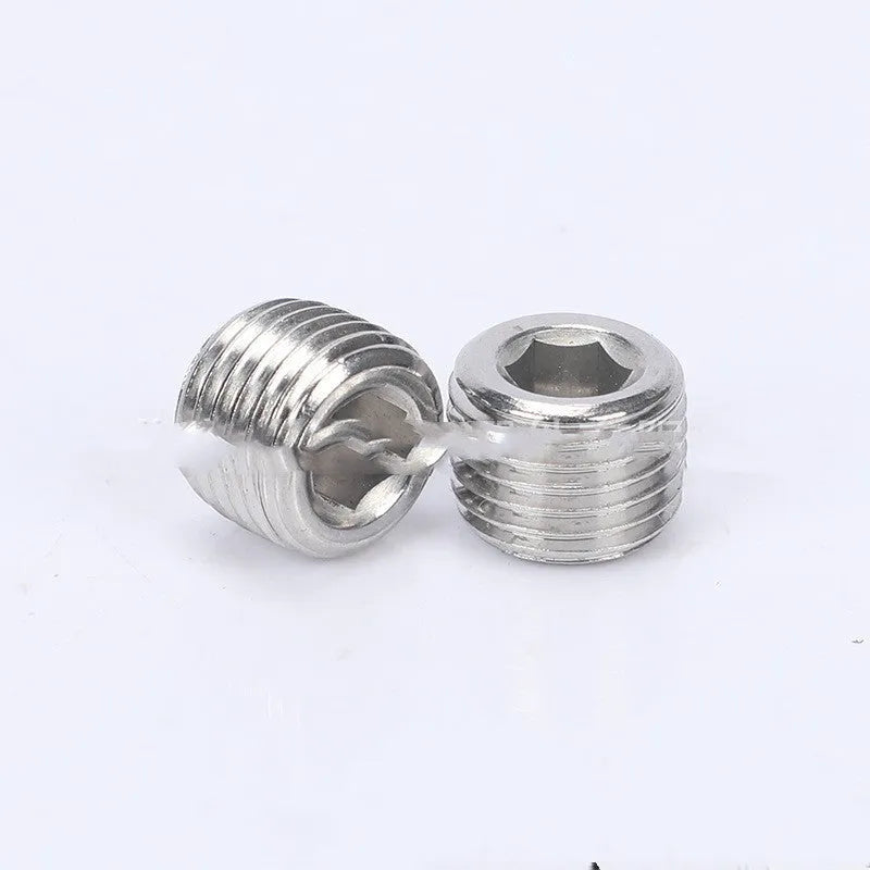 Stainless steel hexagonal pipe plug with 3/8 inch NPT threads for bulkhead fittings.