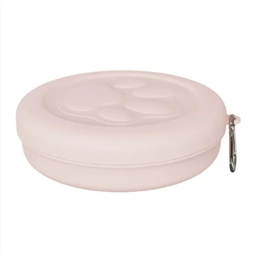 Portable dual-colour dog bowl set with attached snack box in light green and pink.