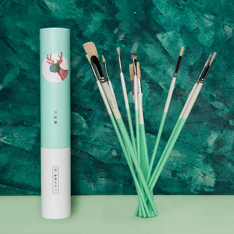 Set of acrylic gouache painting brushes including fan brushes, wide brush and detail brushes in animal-themed designs