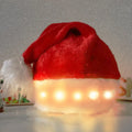 Red and white plush Santa hat with integrated multi-colour LED lights glowing