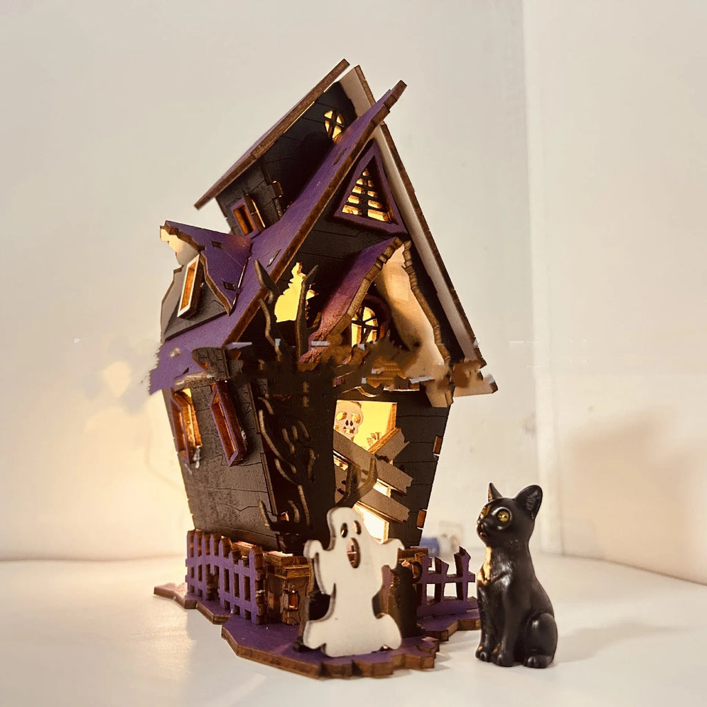 DIY wooden Halloween haunted house decoration kit with luminous design, shown with dimensions 14cm wide by 19cm high.