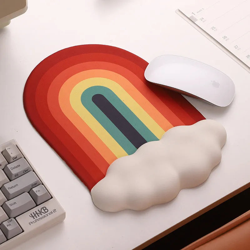 Silicone wrist rest mouse pad and keyboard holder set with cloud pattern on a desk.