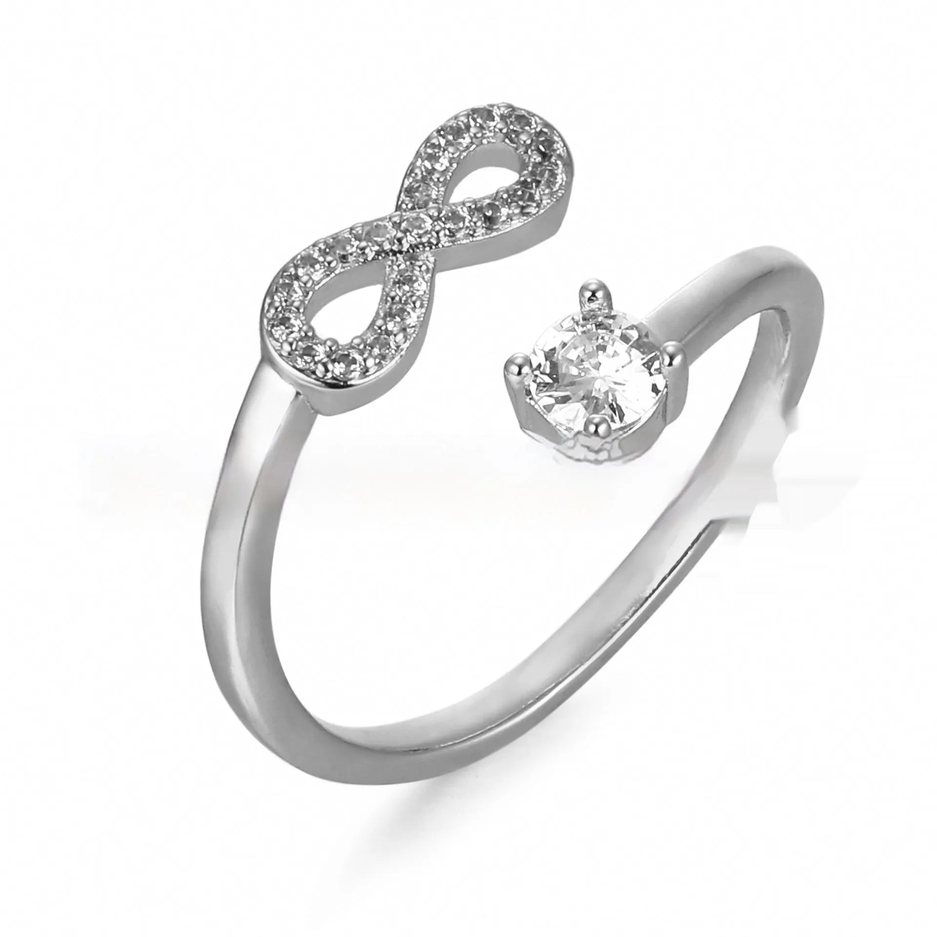 Open geometric ring with a letter charm inlaid with zircon stones, shown in silver finish.