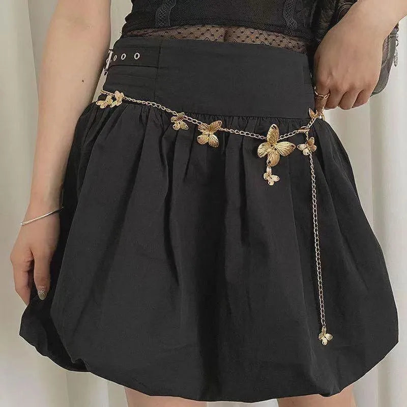 Gold or silver alloy waist chain for women featuring a butterfly design, showing its 104cm length.
