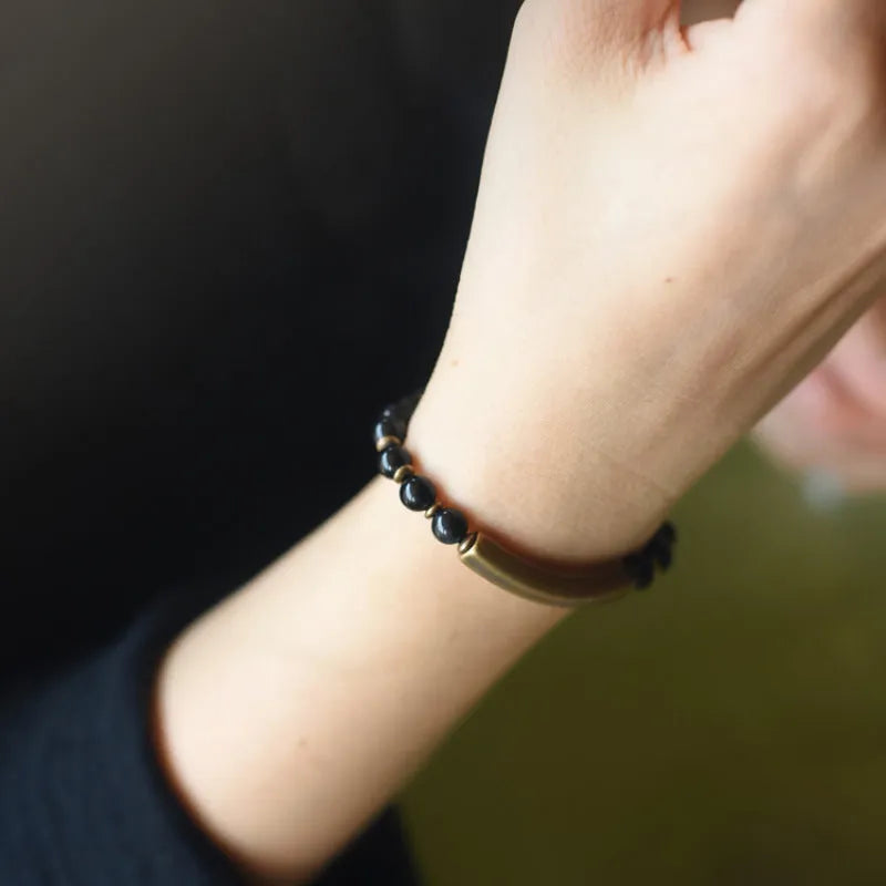Layered retro ethnic bracelet with stone beads in water grass agate, obsidian, and red jasper colours
