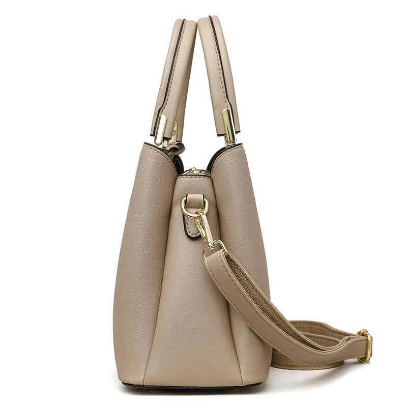 Women's PU leather messenger bag with multiple compartments and adjustable shoulder strap