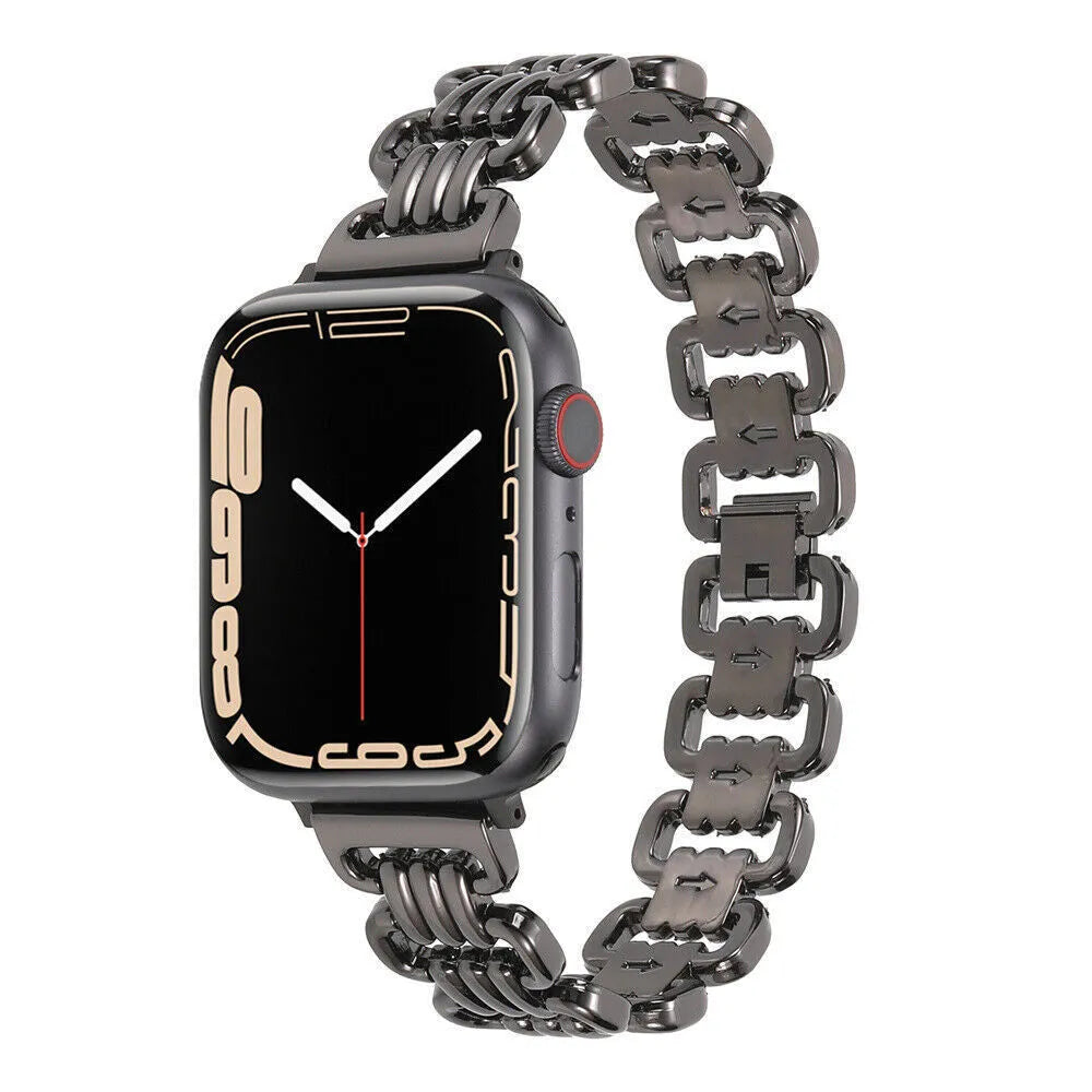 Silver alloy metal replacement bracelet strap for Apple Watch on a table.
