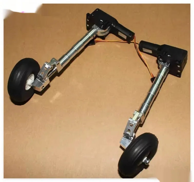 Alloy retractable shock-absorbing landing gear for model aircraft with optional wheels.