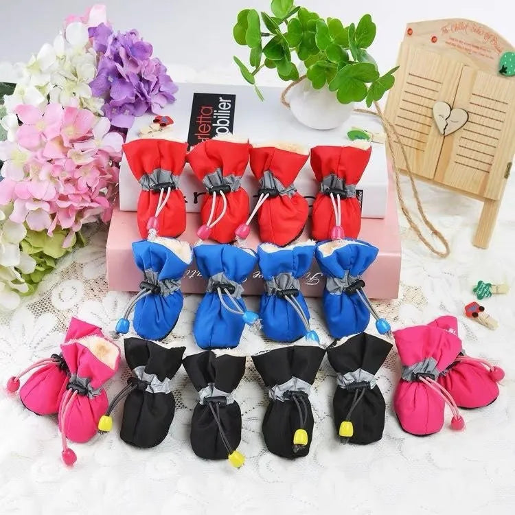Cloth dog shoes with soft soles in multiple colours including fleece-lined options for canine paw protection