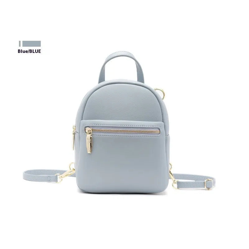 Soft PU mini backpack in street trend style with contrast colour detailing and external pocket.