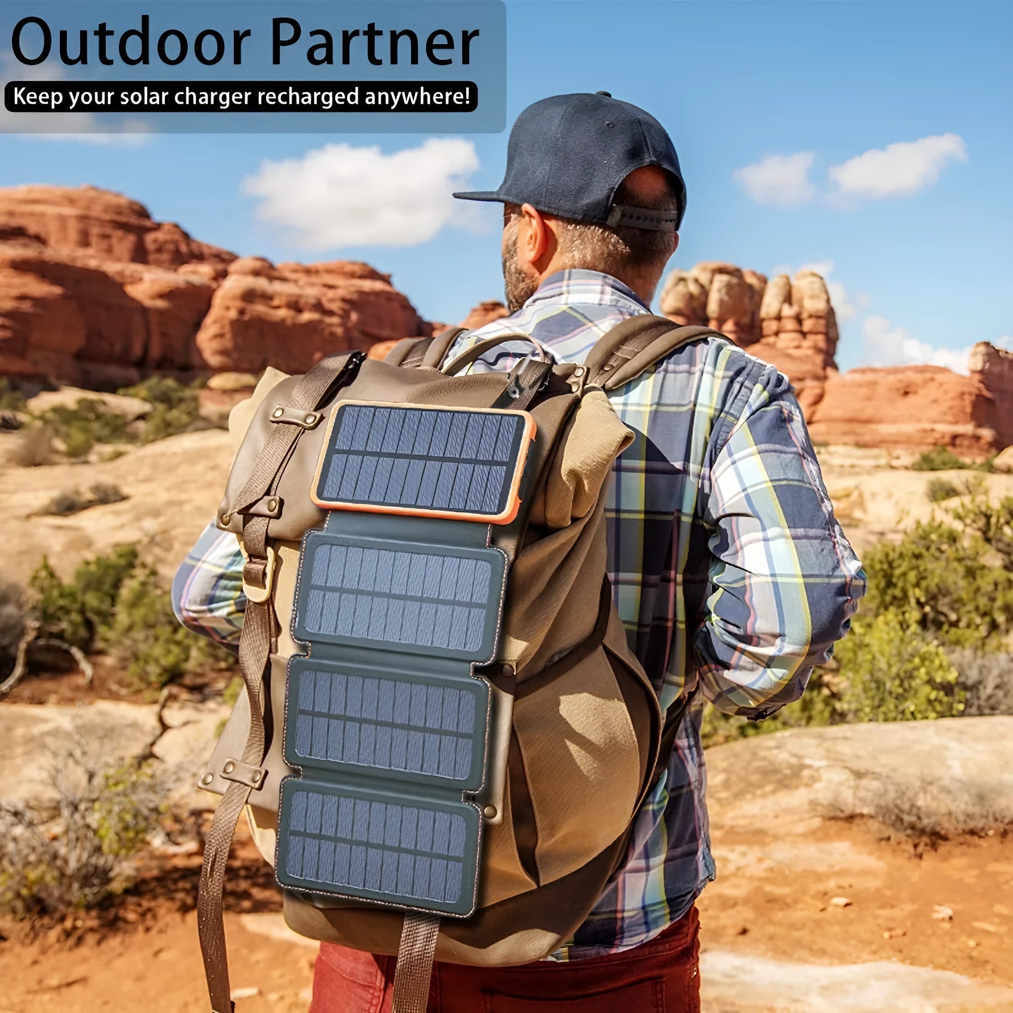 Outdoor solar power bank in black with a solar panel, soft leather finish, and LED light on a grassy field.