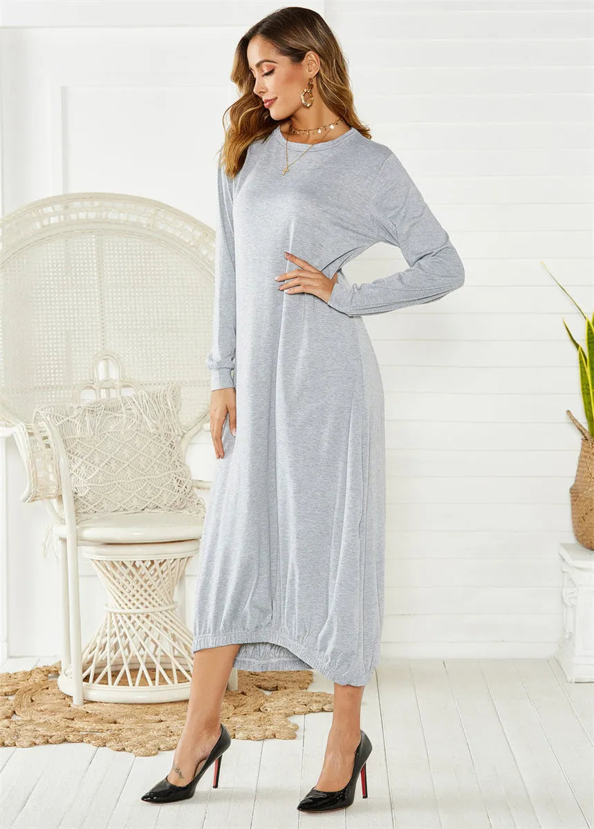 A loose-fitting black lantern dress for women with a lace-up crew neck.