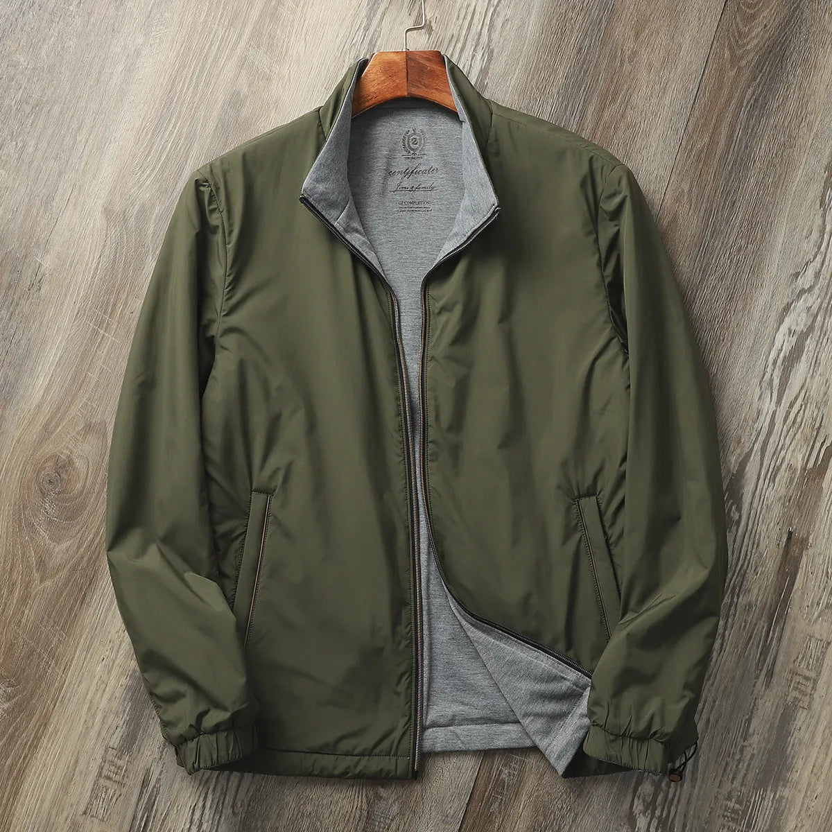 Men's simple stand collar jacket in a polyester-cotton blend, shown in one of four available colours.
