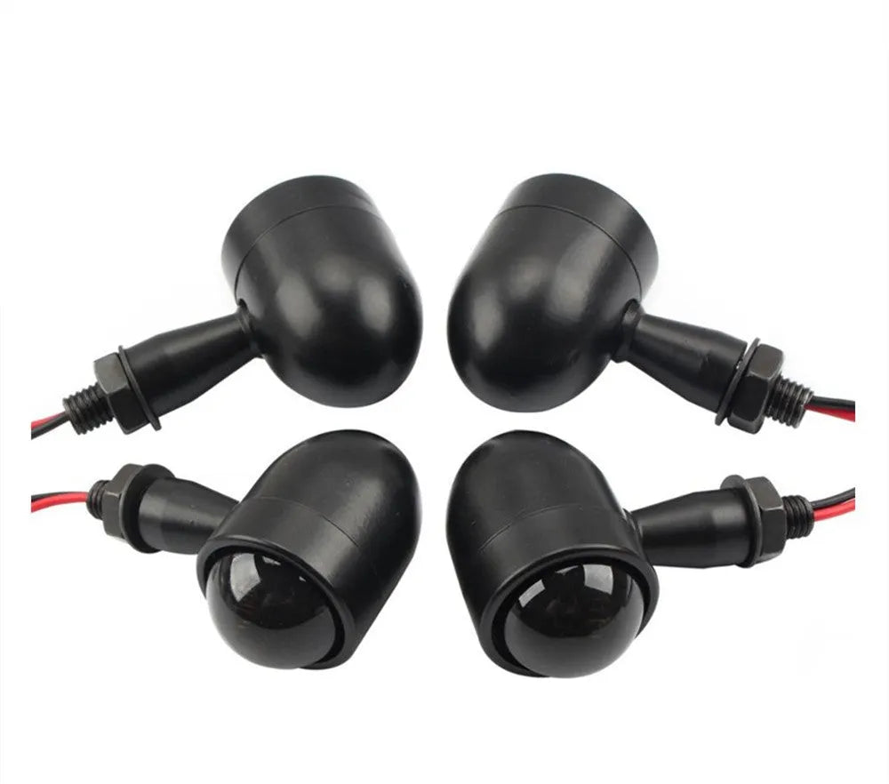 Motorcycle turn signal with metal back shell, plastic lens, 12V 2-wire connection, and 10mm mounting bolt thread