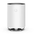 Green USB rechargeable night light humidifier diffuser on table with charging cable