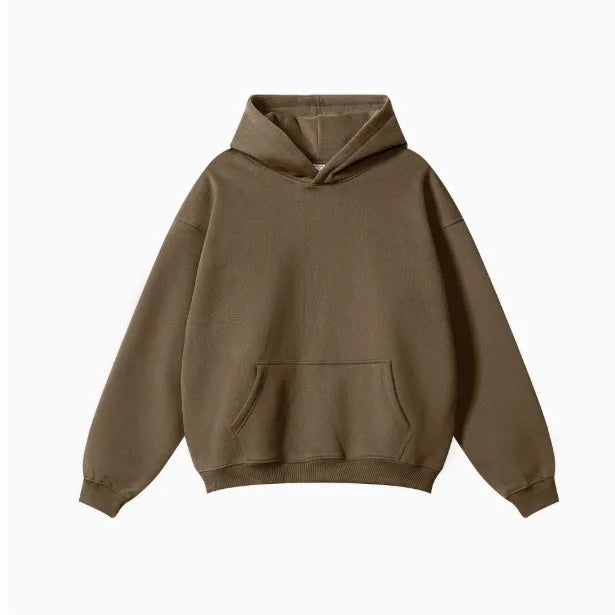 A loose-fitting men's cotton hooded sweater in a pullover style on a hanger.
