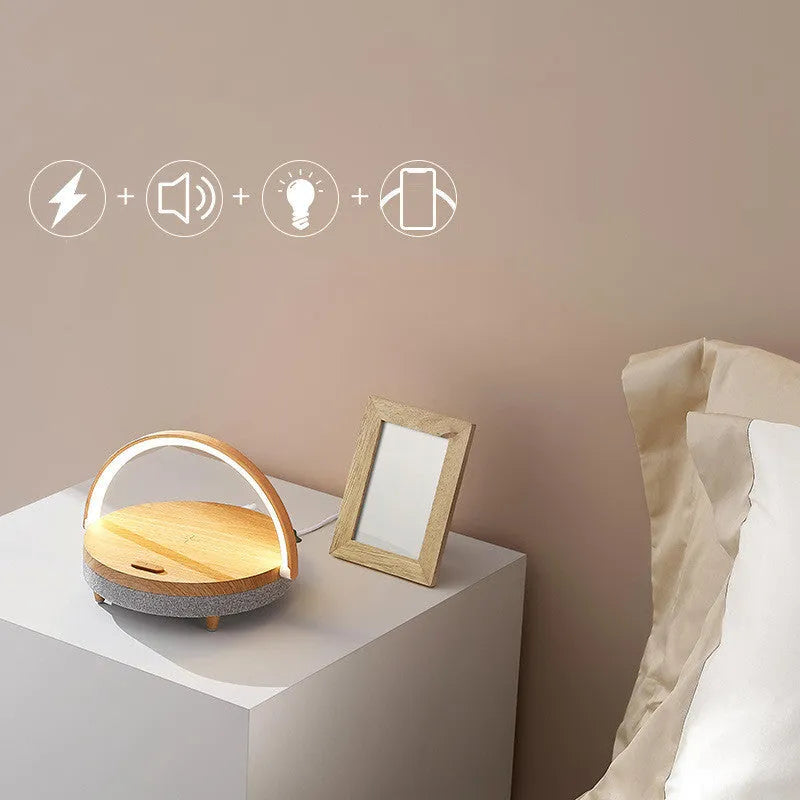 Wireless charging LED night light with Bluetooth speaker and phone holder in marble pattern design