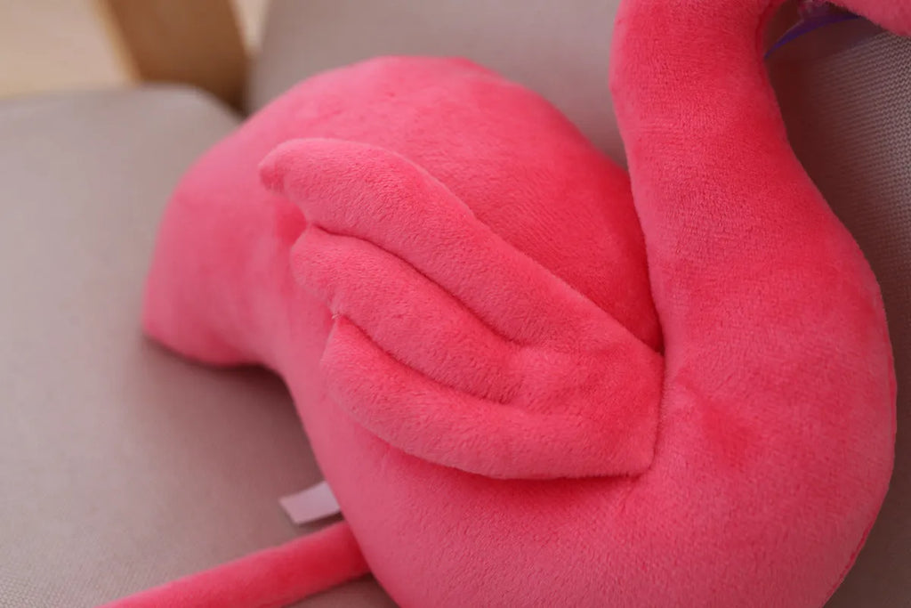 Pink flamingo plush toy with short plush fabric