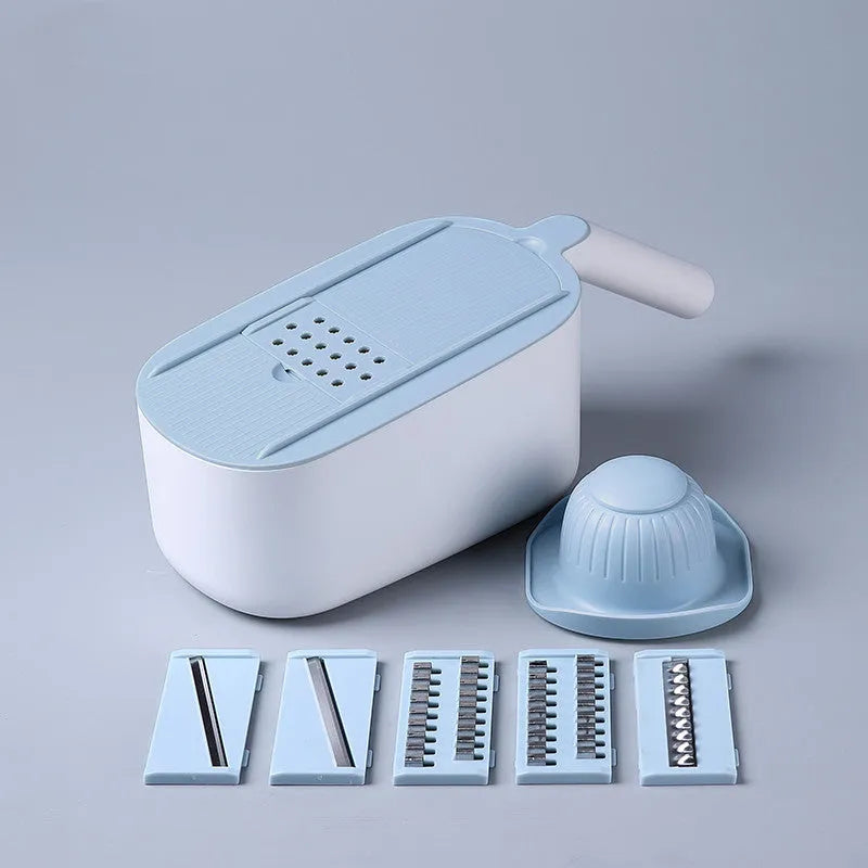 Nordic style manual vegetable slicer with stainless steel blades in blue, grey, and khaki colour options.