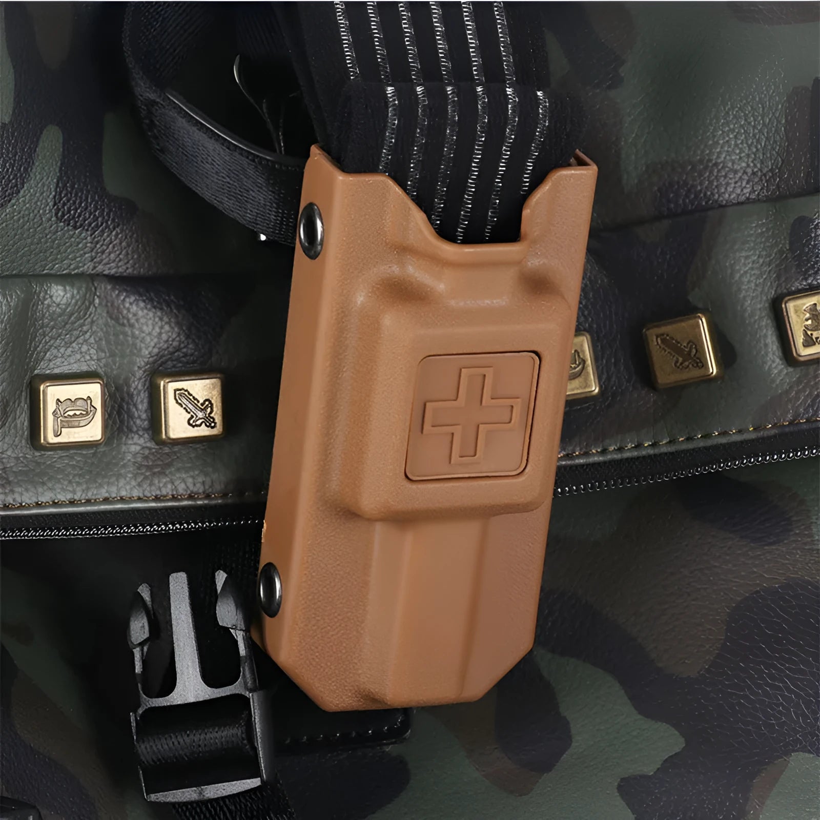 A plastic tourniquet storage box in army green colour, shown closed.