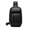 Black medium-sized PVC shoulder bag showing front zipper, air cushion strap, and internal laptop pocket.