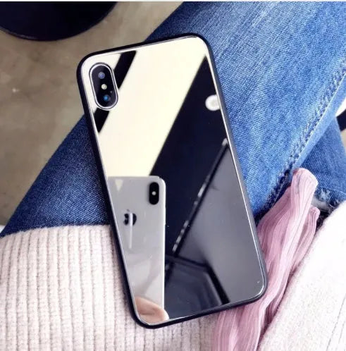 Black iPhone back cover case with a built-in square mirror on the back.