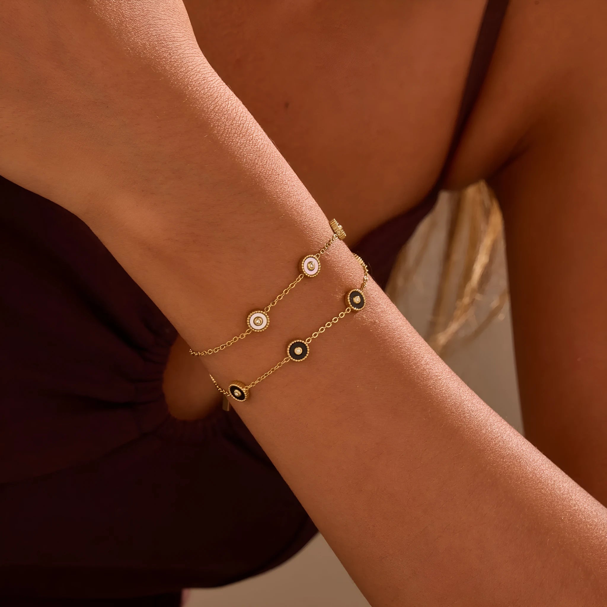 Gold-plated geometric fritillary design stainless steel bracelet and necklace set for women.